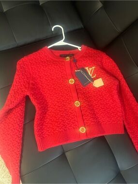 Bright red cardigan